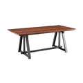 Eettafel van hout met stalen onderstel.